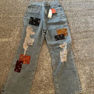 Cider patch work jeans size medium. NWT